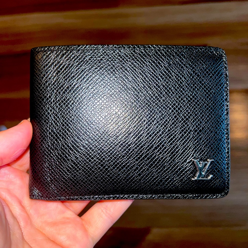 Louis Vuitton Multiple Wallet. Used on special occasion. Basically Brand New